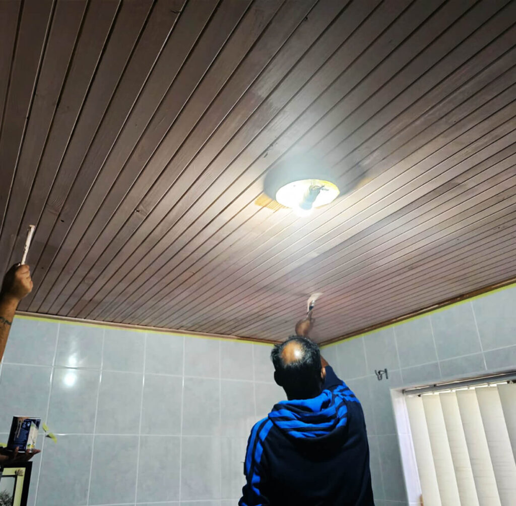 Skilled technician fitting PVC ceiling boards in Cape Town home – PVC Ceiling Installation Cape Town